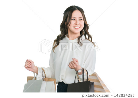 Businesswomen/women who relieve stress by shopping Businesswomen/women who relieve stress by shopping 142824285