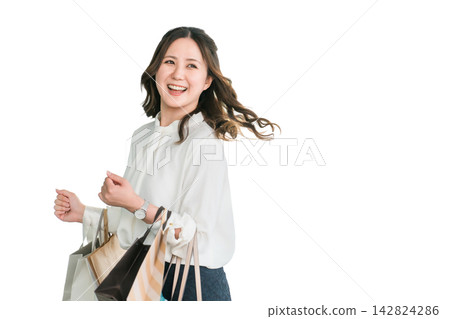 Businesswomen/women who relieve stress by shopping Businesswomen/women who relieve stress by shopping 142824286