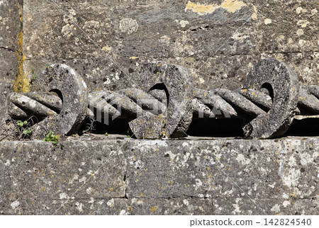 Intricate stonework of twisted rope design at Convento de Cristo in Portugal Intricate stonework of twisted rope design at Convento de Cristo in Portugal 142824540