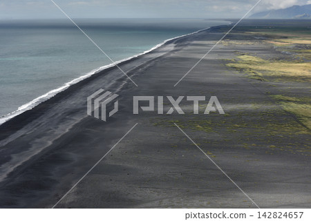 Aerial view of waves crashing on Reynisfjara black sand beach Iceland Aerial view of waves crashing on Reynisfjara black sand beach Iceland 142824657