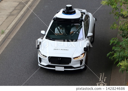 Image of a car undergoing autonomous driving testing. Image of a car undergoing autonomous driving testing. 142824686