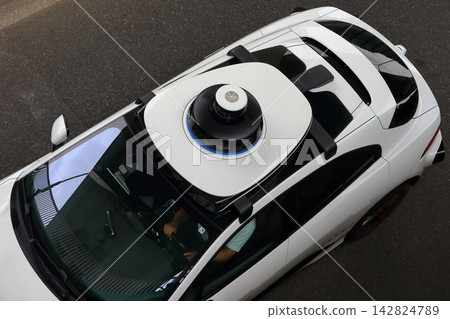 Image of a car undergoing autonomous driving testing. Image of a car undergoing autonomous driving testing. 142824789