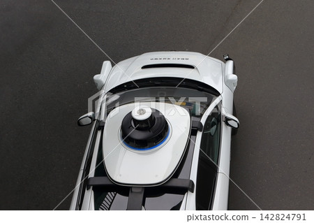 Image of a car undergoing autonomous driving testing. Image of a car undergoing autonomous driving testing. 142824791