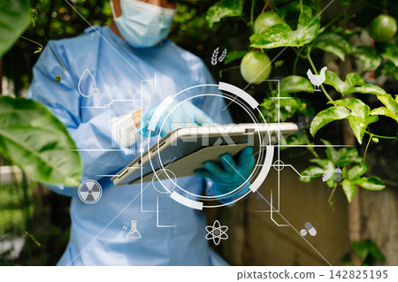 Agricultural scientist examining plant extract in a lab flask with smart agritech icons, advancing sustainable biotechnology and modern crop science. Agricultural scientist examining plant extract in a lab flask with smart agritech icons, advancing sustainable biotechnology and modern crop science. 142825195