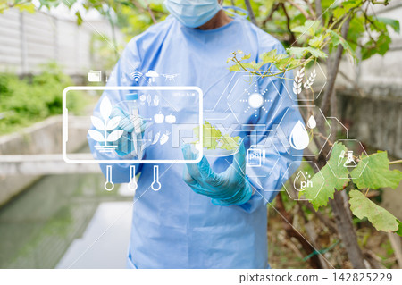 Agricultural scientist examining plant extract in a lab flask with smart agritech icons, advancing sustainable biotechnology and modern crop science. Agricultural scientist examining plant extract in a lab flask with smart agritech icons, advancing sustainable biotechnology and modern crop science. 142825229