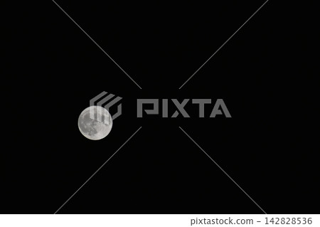 moon floating in the night sky moon floating in the night sky 142828536