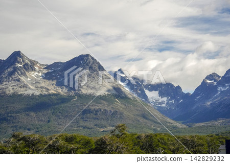 Patagonian Mountain Range Near Ushuaia with Snow and Forest Patagonian Mountain Range Near Ushuaia with Snow and Forest 142829232