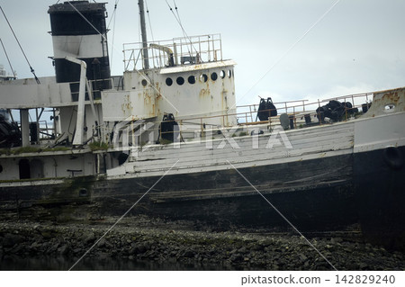 Abandoned Rusty Ship Wreck Beached in Ushuaia Patagonia Abandoned Rusty Ship Wreck Beached in Ushuaia Patagonia 142829240
