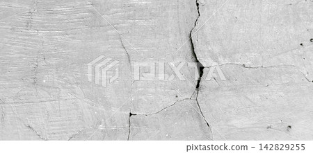 Cracked gray concrete wall texture Cracked gray concrete wall texture 142829255