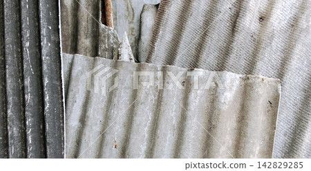 Stacked Corrugated Asbestos and Metal Sheets Stacked Corrugated Asbestos and Metal Sheets 142829285