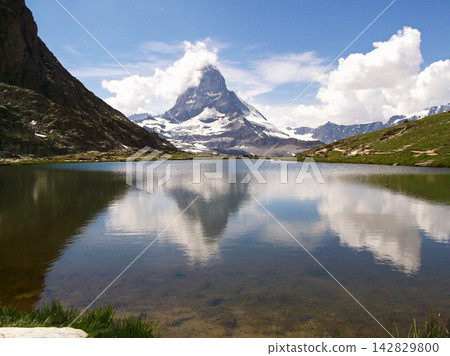 Switzerland, Zermatt: Lake Riffelsee and the Matterhorn Switzerland, Zermatt: Lake Riffelsee and the Matterhorn 142829800