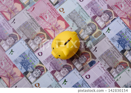 A piggy bank as a concept for storing, accumulating, and saving financial resources. A piggy bank A piggy bank as a concept for storing, accumulating, and saving financial resources. A piggy bank 142830154