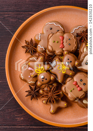 Sweet, colorful, homemade Christmas gingerbread cookies. Christmas gingerbread cookies Sweet, colorful, homemade Christmas gingerbread cookies. Christmas gingerbread cookies 142830210