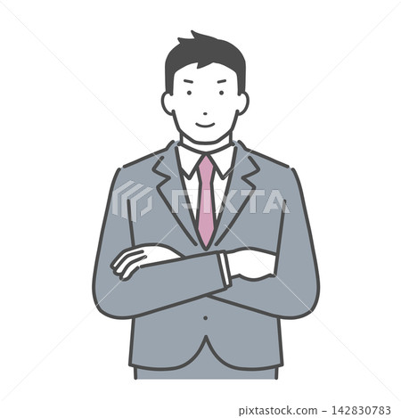 A man in a suit with his arms crossed A man in a suit with his arms crossed 142830783