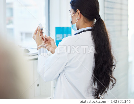 Woman, face mask and doctor syringe in clinic, healthcare and prevention of disease or virus. Female person, vaccine and vial for treatment or immunity booster, treatment and viral liquid drugs Woman, face mask and doctor syringe in clinic, healthcare and prevention of disease or virus. Female person, vaccine and vial for treatment or immunity booster, treatment and viral liquid drugs 142831345