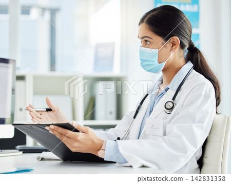 Documents, healthcare and insurance with doctor asian woman in hospital for appointment or consulting. Covid, mask and medical with serious medicine professional in clinic for diagnosis or feedback Documents, healthcare and insurance with doctor asian woman in hospital for appointment or consulting. Covid, mask and medical with serious medicine professional in clinic for diagnosis or feedback 142831358
