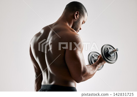 Man, studio and body with weights for workout for healthy living or fitness and committed on white background. Gym equipment, back and dumbbells for gym or training with wellness and exercise Man, studio and body with weights for workout for healthy living or fitness and committed on white background. Gym equipment, back and dumbbells for gym or training with wellness and exercise 142831725