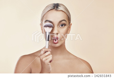 Girl, portrait and brush in studio for beauty with makeup, cosmetic tool and glow with blush or foundation for self care. Woman, mockup and isolated with product for natural shine and aesthetic. Girl, portrait and brush in studio for beauty with makeup, cosmetic tool and glow with blush or foundation for self care. Woman, mockup and isolated with product for natural shine and aesthetic. 142831843