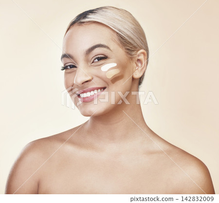 Woman, portrait and makeup swatches for foundation decision on studio background, cosmetics or smile. Female person, face and beauty product with skin tone choice with testing, concealer or shade Woman, portrait and makeup swatches for foundation decision on studio background, cosmetics or smile. Female person, face and beauty product with skin tone choice with testing, concealer or shade 142832009