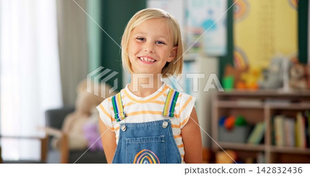 Girl, child and face or happy in classroom for education, knowledge or fun learning with confidence. Student, person and portrait with smile at kindergarten for studying, pride and academy or school Girl, child and face or happy in classroom for education, knowledge or fun learning with confidence. Student, person and portrait with smile at kindergarten for studying, pride and academy or school 142832436
