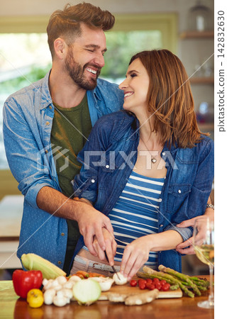 Happy, love and couple with cooking in kitchen for healthy dinner, nutrition and meal prep together. Vegan, man and woman with helping in support for food, organic ingredients or preparation in house Happy, love and couple with cooking in kitchen for healthy dinner, nutrition and meal prep together. Vegan, man and woman with helping in support for food, organic ingredients or preparation in house 142832630