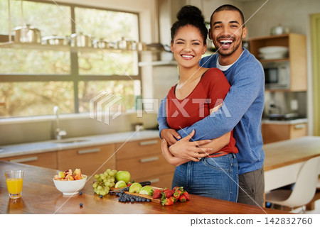 Portrait, house and couple with smile, hug and peace with romance, relationship and bonding together. Kitchen, embrace or man with woman, nutrition or vegan breakfast with care, happiness or marriage Portrait, house and couple with smile, hug and peace with romance, relationship and bonding together. Kitchen, embrace or man with woman, nutrition or vegan breakfast with care, happiness or marriage 142832760