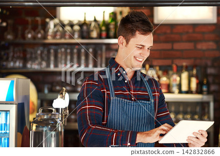 Restaurant, employee and man with tablet, typing and connection with internet, app and service industry. Person, business owner and payment with tech, website info and check order with online menu Restaurant, employee and man with tablet, typing and connection with internet, app and service industry. Person, business owner and payment with tech, website info and check order with online menu 142832866