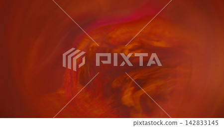 Glitter liquid splash. Blur orange ink. Red golden color round shiny pigment bright texture vibrant art circle on abstract background. Glitter liquid splash. Blur orange ink. Red golden color round shiny pigment bright texture vibrant art circle on abstract background. 142833145