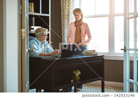 Laptop, home office and senior couple with conversation for budget, savings and investment or insurance. Study room, retirement and relationship for house finance on internet for online banking Laptop, home office and senior couple with conversation for budget, savings and investment or insurance. Study room, retirement and relationship for house finance on internet for online banking 142833146