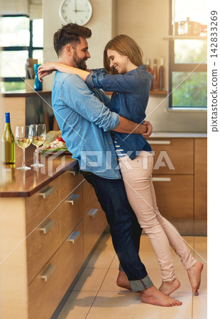 Cooking, food and hug with couple in kitchen of home together for bonding, love or romance. Safety, smile or trust with happy man and woman embracing in apartment for diet, health or wellness Cooking, food and hug with couple in kitchen of home together for bonding, love or romance. Safety, smile or trust with happy man and woman embracing in apartment for diet, health or wellness 142833269
