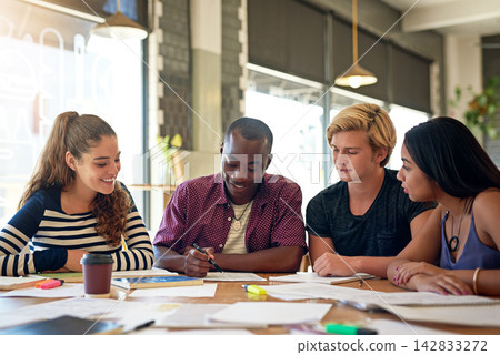 Student, writing and university notes at cafe with group, education and exam study for learning. College research, restaurant and smile of young people with school project and paperwork for test 142833272