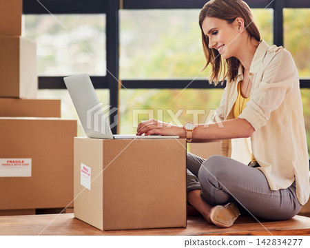 Happy, woman and laptop with boxes for moving day, real estate and house relocation for planning and contact. Smile, female person and computer on parcel for email about investment and mortgage Happy, woman and laptop with boxes for moving day, real estate and house relocation for planning and contact. Smile, female person and computer on parcel for email about investment and mortgage 142834277