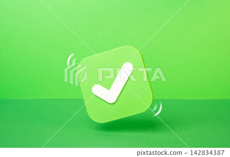An approval checkmark on a green background. Democratic elections. Task completion and successful project finish. Trust, civic duty and participation. An approval checkmark on a green background. Democratic elections. Task completion and successful project finish. Trust, civic duty and participation. 142834387
