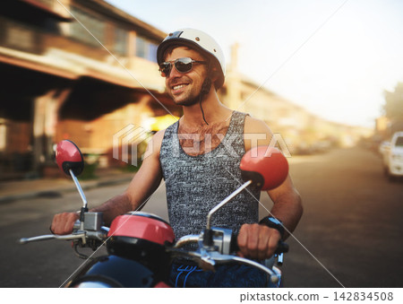 Motorbike, speed and man in city with helmet for vacation travel, road trip and excited for weekend journey. Male tourist, street and sustainable transport for holiday freedom and adventure in Mexico Motorbike, speed and man in city with helmet for vacation travel, road trip and excited for weekend journey. Male tourist, street and sustainable transport for holiday freedom and adventure in Mexico 142834508