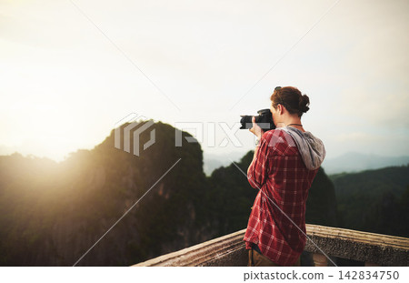 Man, photographer and camera for hiking, mountains and nature with shooting for job at eco magazine. Person, journalist and outdoor for photoshoot by mockup space, sky or creative in morning sunshine Man, photographer and camera for hiking, mountains and nature with shooting for job at eco magazine. Person, journalist and outdoor for photoshoot by mockup space, sky or creative in morning sunshine 142834750