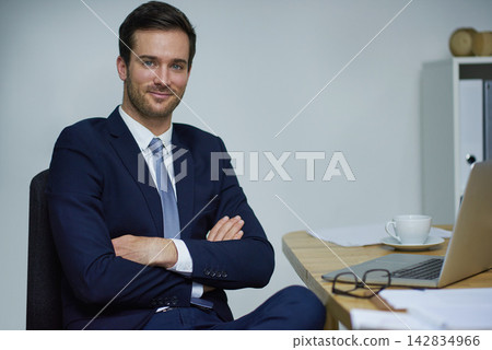 Businessman, confident and portrait with tech in office, workplace or company as advertising executive. Male person, professional and smile at desk in corporate, job and career as management or boss Businessman, confident and portrait with tech in office, workplace or company as advertising executive. Male person, professional and smile at desk in corporate, job and career as management or boss 142834966