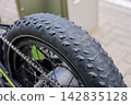 Extreme wear of a fat bike rear tire close up 142835128