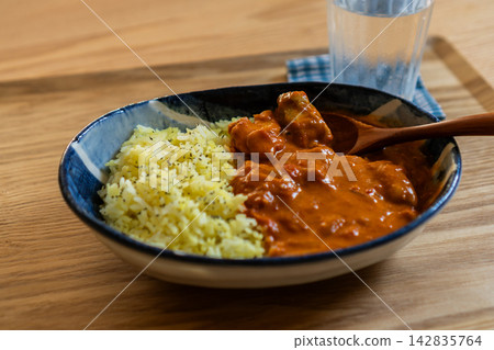 Authentic chicken curry with chunky pieces of meat and rice 142835764