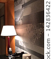 The interior design of the luxury hotel features a modern Japanese style and indirect lighting. 142836422