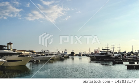Sochi Grand Marina with yachts and Olympic rings in Sochi, Russia Sochi Grand Marina with yachts and Olympic rings in Sochi, Russia 142838177