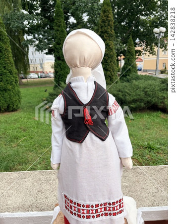 Traditional Eastern European folk costume on a mannequin outdoors Traditional Eastern European folk costume on a mannequin outdoors 142838218