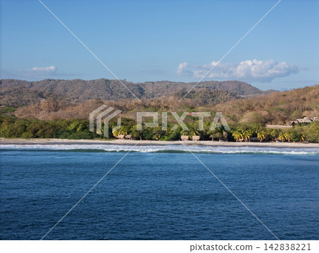 Tropical beach with big waves aerail view Tropical beach with big waves aerail view 142838221
