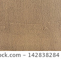 Light brown painted wall/mortar-like texture background material 142838284