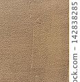 Light brown painted wall/mortar-like texture background material 142838285