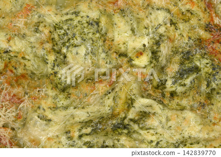 Detailed texture of baked spinach lasagna Detailed texture of baked spinach lasagna 142839770