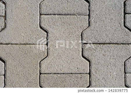 Horizontal View of Grey Concrete Interlocking Paving Stones Horizontal View of Grey Concrete Interlocking Paving Stones 142839775