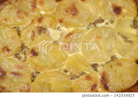Baked potato moussaka texture close up Baked potato moussaka texture close up 142839925