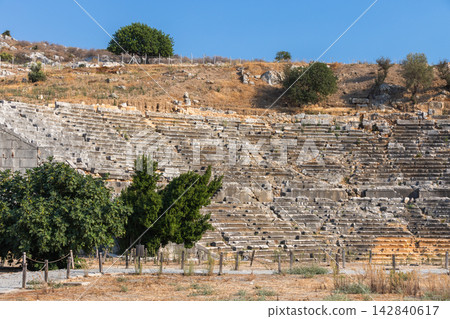 A historic stone amphitheater ruins with terraced seating, Patara, Turkey A historic stone amphitheater ruins with terraced seating, Patara, Turkey 142840617
