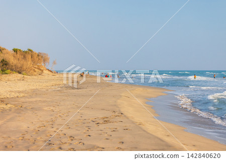 Kumluova Plaji, Patara, Turkey. A wide sandy beach landscape Kumluova Plaji, Patara, Turkey. A wide sandy beach landscape 142840620