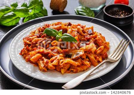 Penne con chorizo y setas Spanish style pasta Penne con chorizo y setas Spanish style pasta 142840676